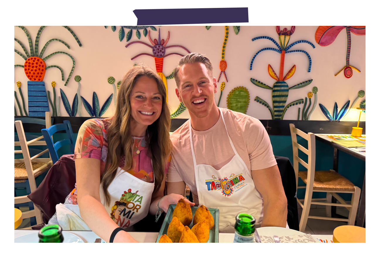 Photo of a couple doing a cooking class