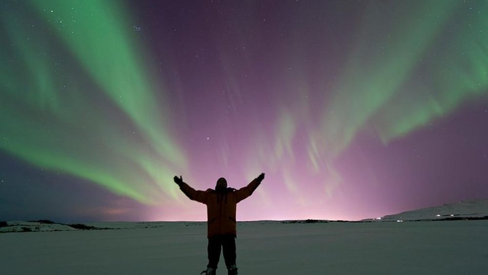 Fontana Geothermal Baths under Northern Lights from Reykjavik