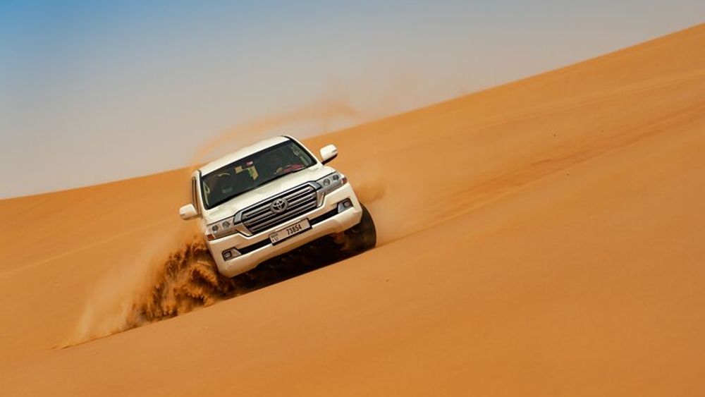 Dubai Sunset Desert Safari with BBQ and Camel Ride