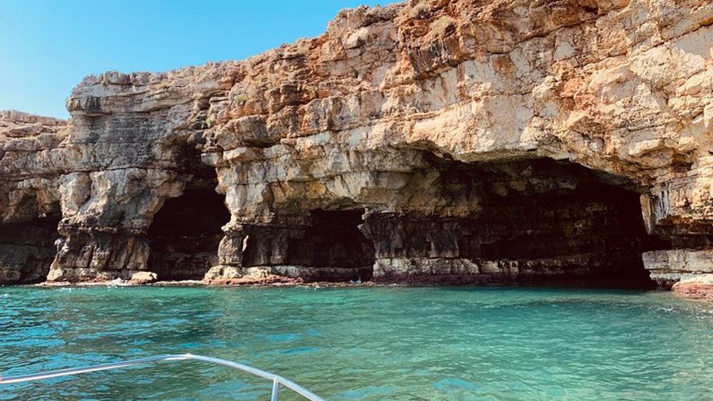 Polignano a Mare Grottoes Boat Tour with Swimming and Prosecco