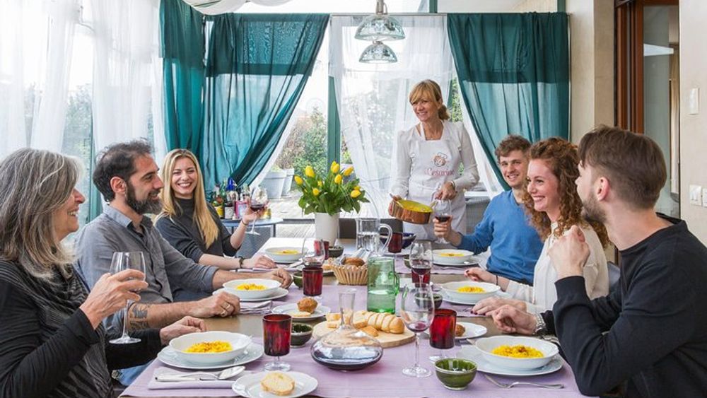 Dining experience at a local's home in Milan with show cooking