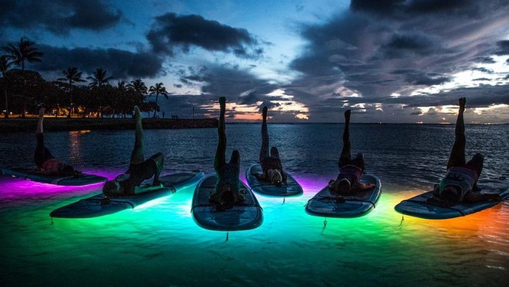 Night SUP Yoga in Honolulu, Hawaii