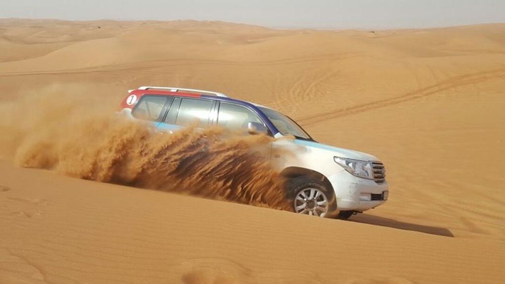 Sunrise/Morning Dune Drive with Camel Trek & Sand Surfing