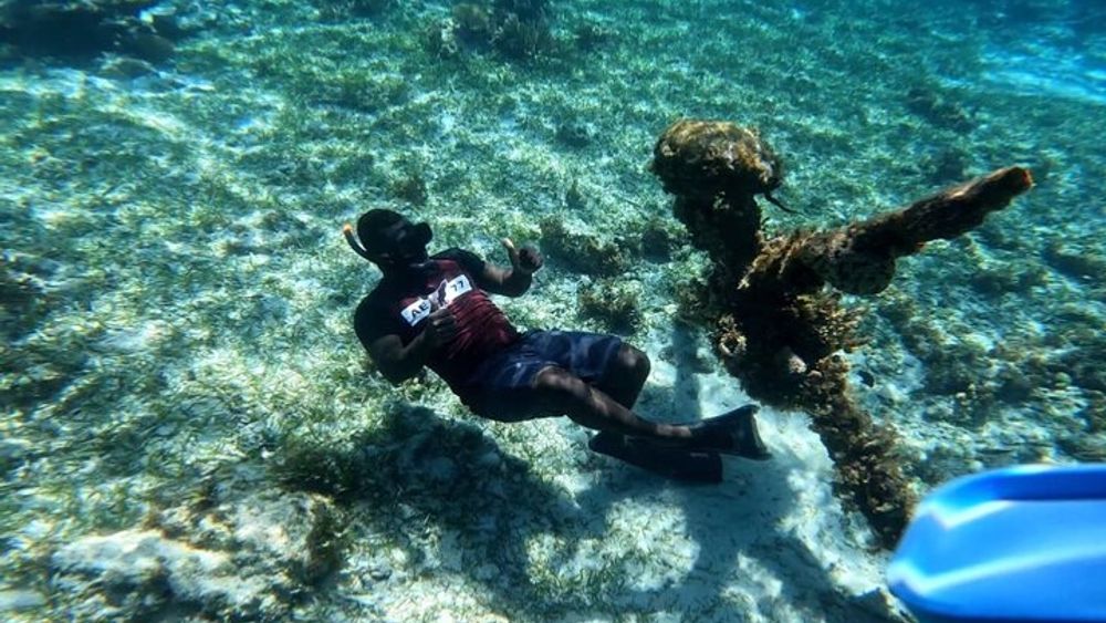 Negril Glass Bottom Boat Tour Snorkeling and Booby Cay