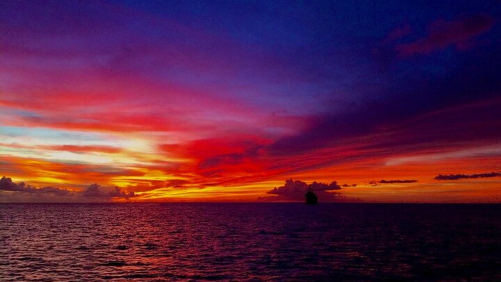 Grand Anse Bay Sunset and Champagne Group Cruise