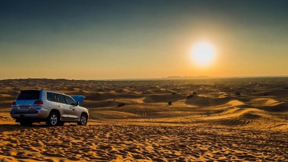 Sunrise View Desert Safari with Camel Ride & Sand Boarding